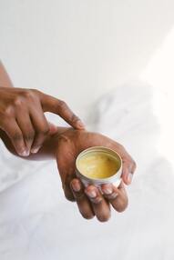 hands applying a salve | Song's Acupuncture & Herbal Clinic